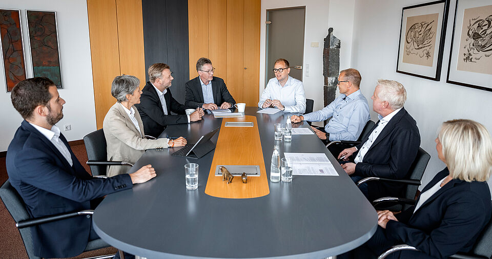 Das COLLEGIUM-Team im Konferenzraum